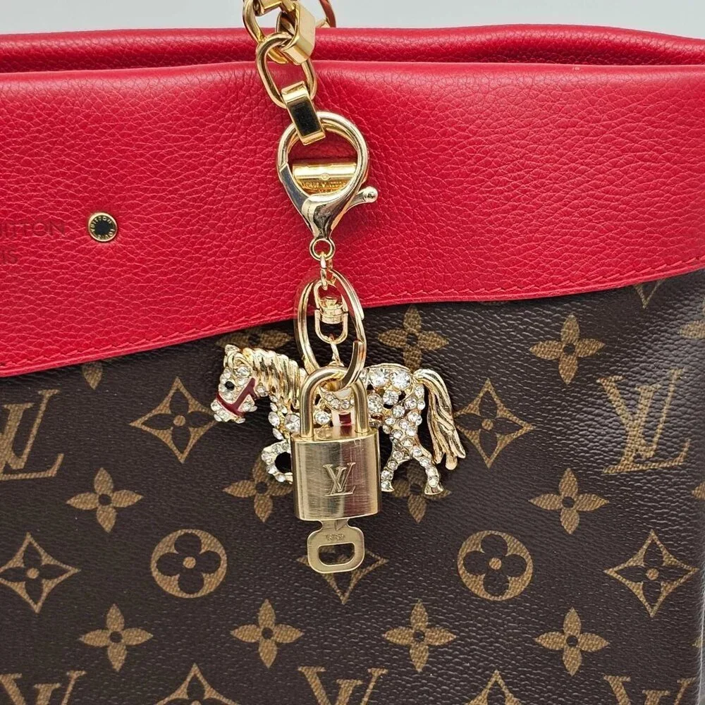 Authentic Louis Vuitton Lock & Key with unbranded Horse Bagcharm 020326